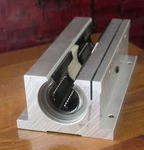 New Thomson TWN24OPN Twin Pillow Block W/ Linear Ball Bearing Races. Fixed Price $549.95.