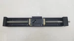 Nsk MCM06 Ball Screw Driven Positioning Stage 37CM; Pitch 5MM; 8MM Diameter. Fixed Price $250.00.