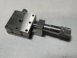 Optosigma TSDS-251C 25MM Steel Manual X-axis Stage W/ Center Micrometer. Fixed Price $69.00.