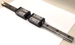 Thk SSR35XW2SSC1+700L Dual Linear Bearing Block And Rail 700MM 27-9/16". Fixed Price $350.00.